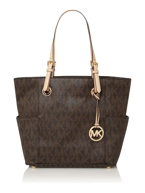 michael kors jet travel bag|Michael Kors designer tote jet set.